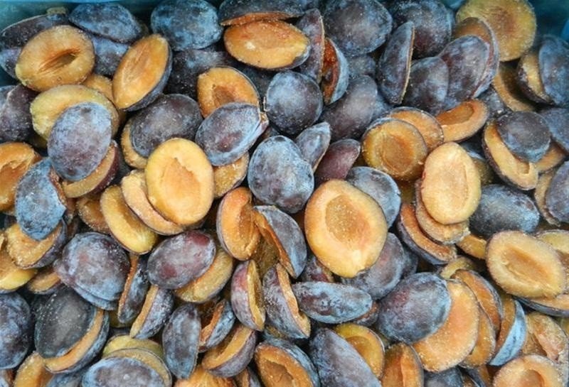 Frozen plum halves