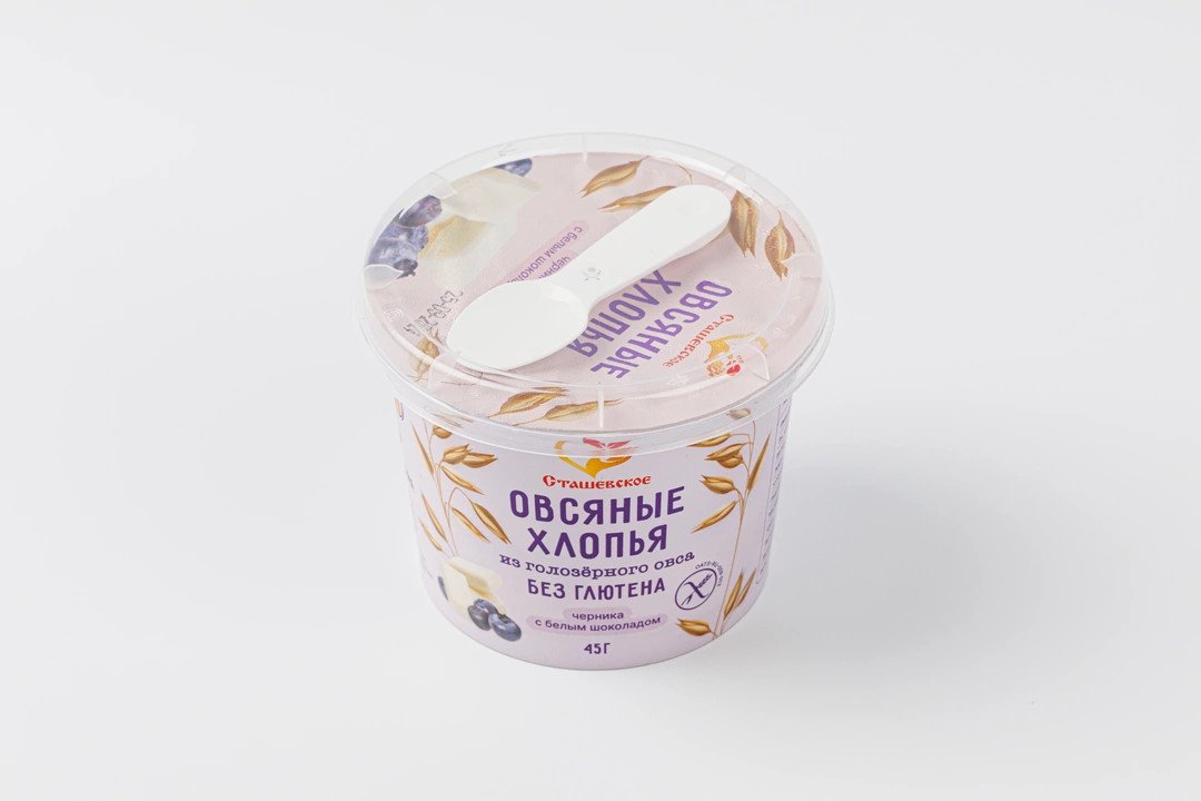 Gluten-free oat flakes from hull oats with the addition of white chocolate and blueberries
